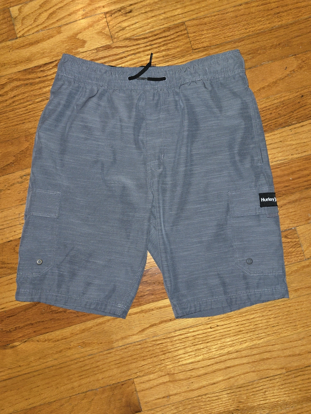 7 pairs. Hurley, Volcom And Champion Big Boy Shorts Size Medium 10-12